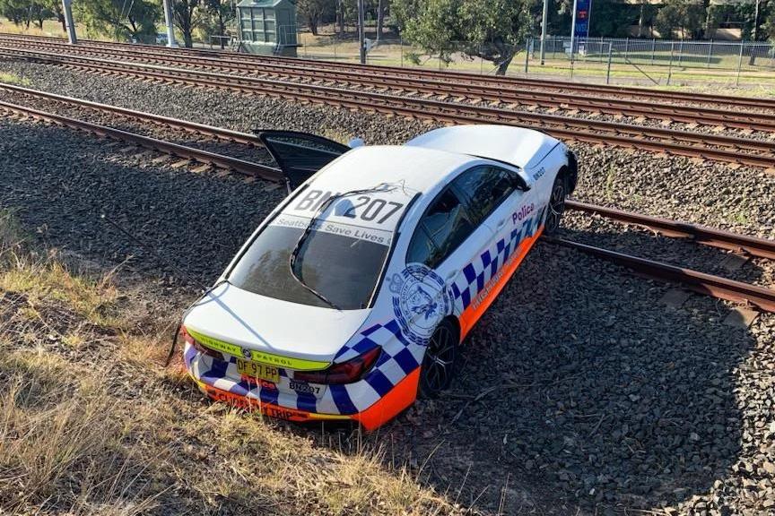 NSW Police Launch Internal Investigation After Officers Crash Onto Train Tracks During Alleged Pursuit